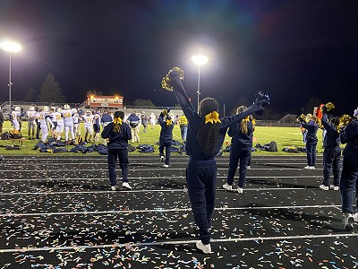 Cheering at Football Game