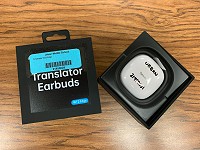 Photo of the one of the three Translator Earbuds sets donated to Urban Middle School.