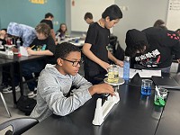 George D. Warriner Middle School students working on a science project.