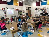 Sheboygan Area School District Wilson Elementary School. Wilson students participating in a video chat with a guest speaker.